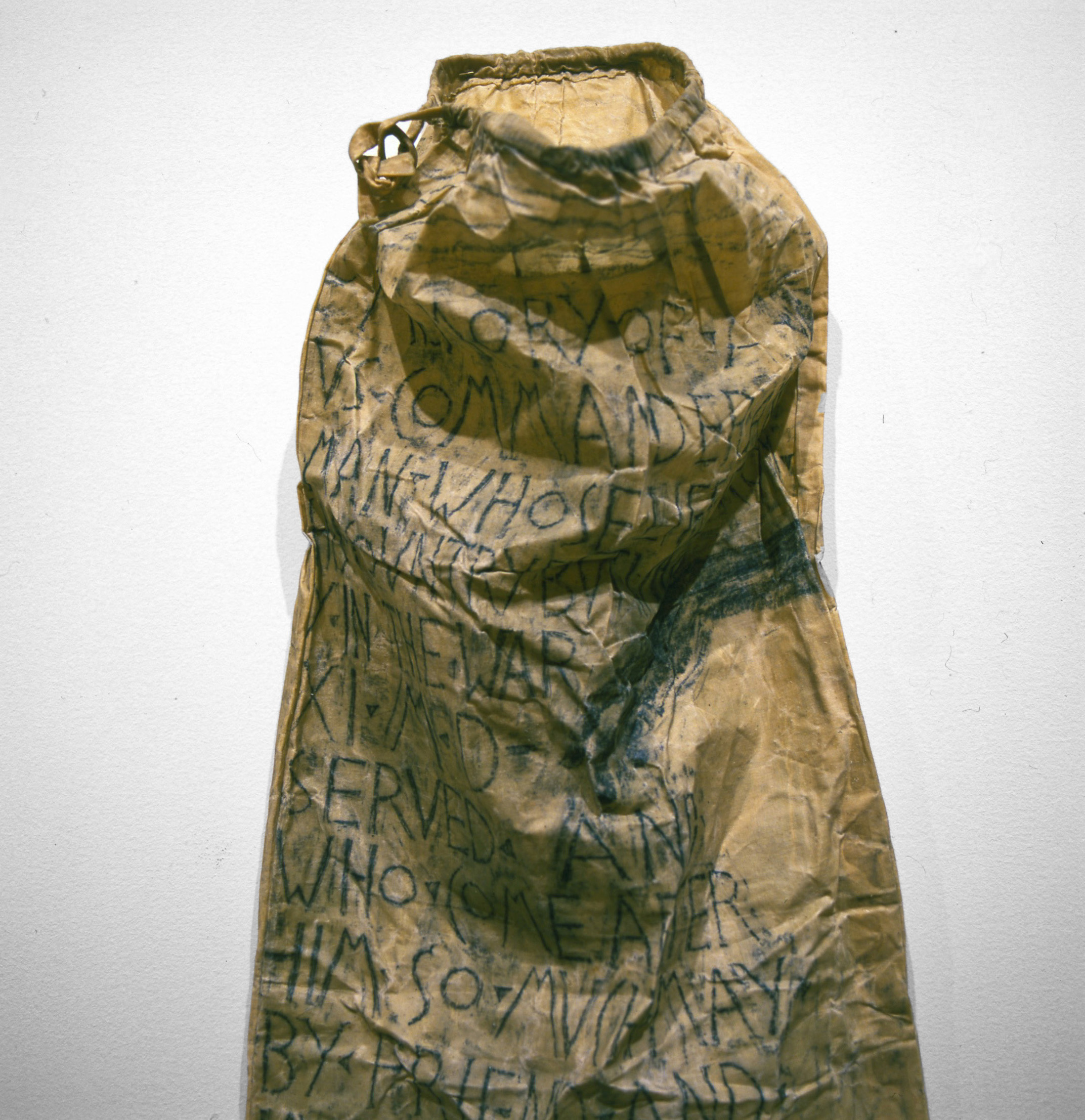 For this installation, the artist took rubbings onto muslin from structures—parks, buildings, sidewalks—on the sites of more than a dozen former burial grounds in Manhattan lost to development. The waxed muslin sacks refer to colonial-era cerecloth